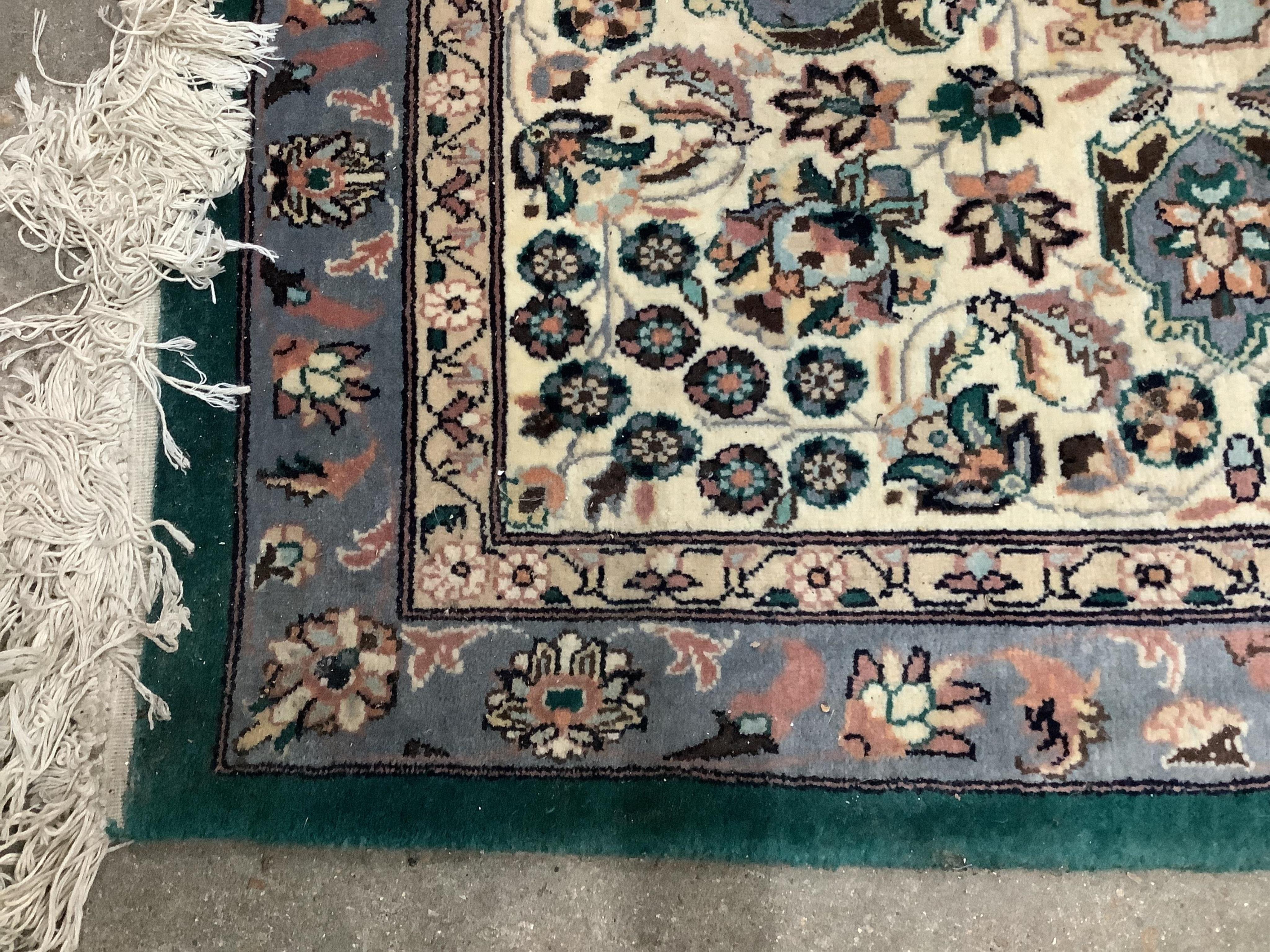 A large Indian Kashmir carpet, 420 x 300cm. Condition - good